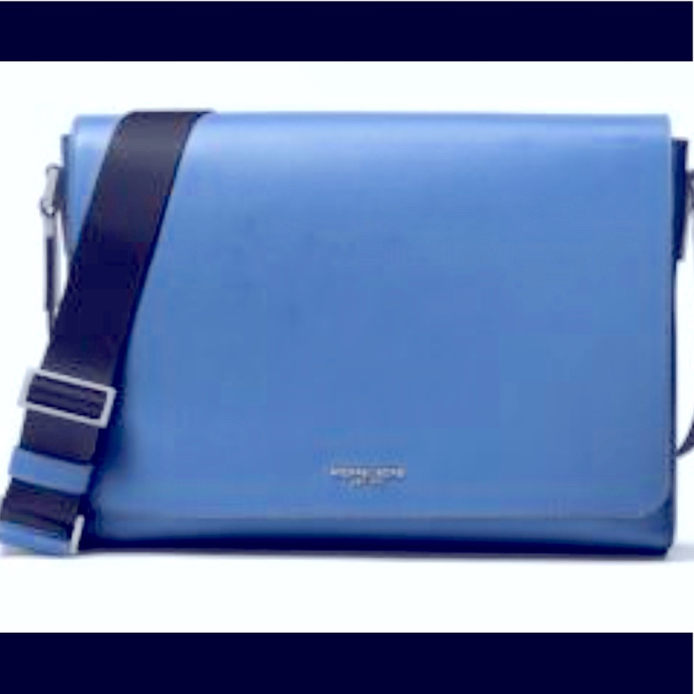 Leather Michael Kors messenger bag. Fits 11’ laptop has multiple pockets.